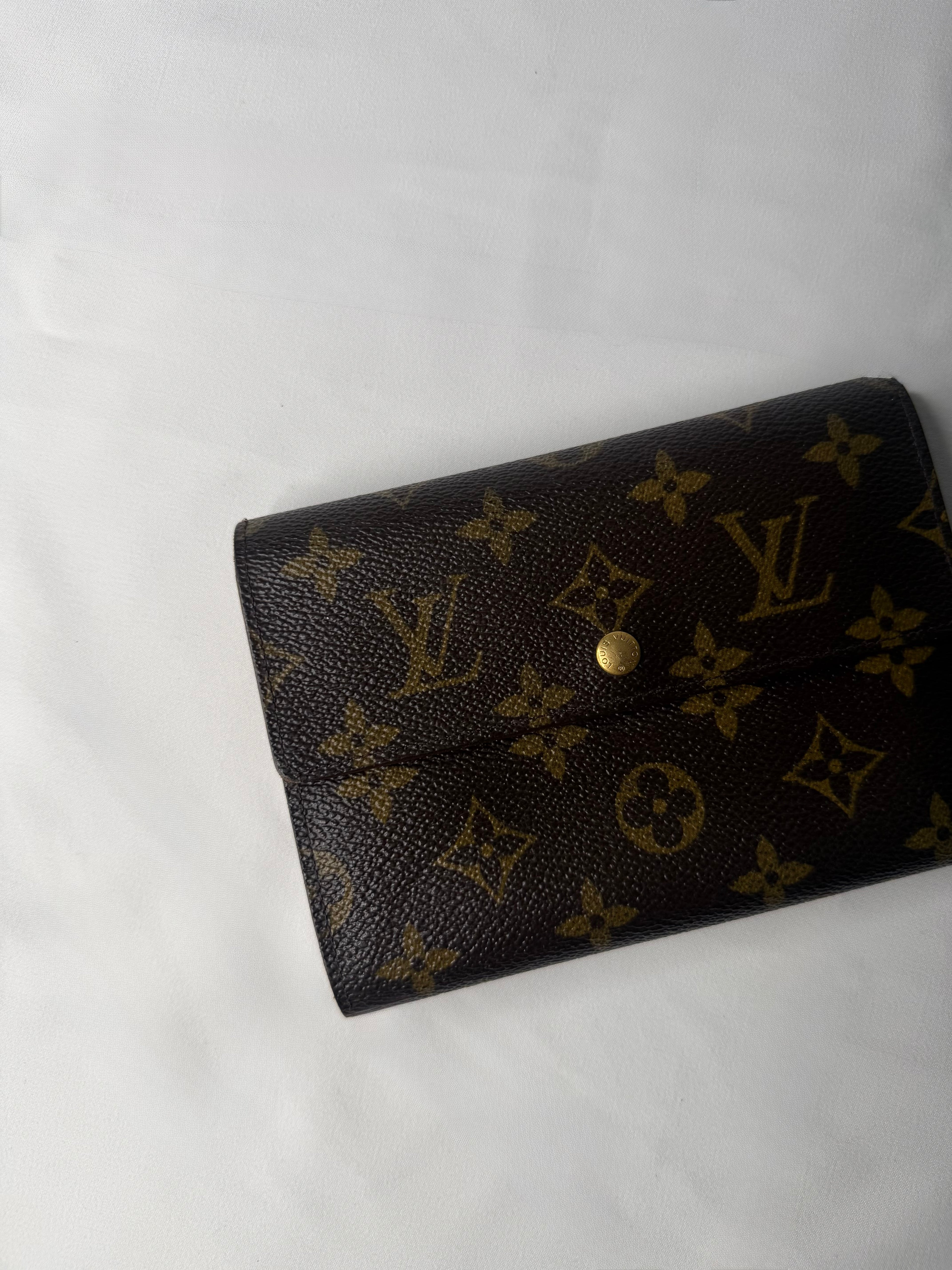 Portefeuille Porte-Trésor International Louis Vuitton n°MIO995 (Grade C)