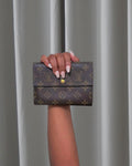 Portefeuille Porte-Trésor International Louis Vuitton n°MIO995 (Grade C)