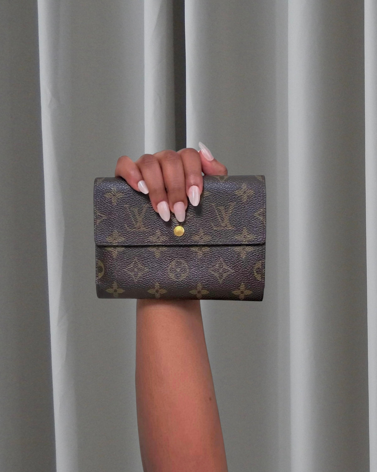 Portefeuille Porte-Trésor International Louis Vuitton n°MIO995 (Grade C)